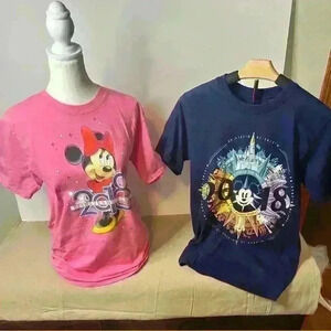 Two 2018 discover the magic disney t-shirts.  Both small.